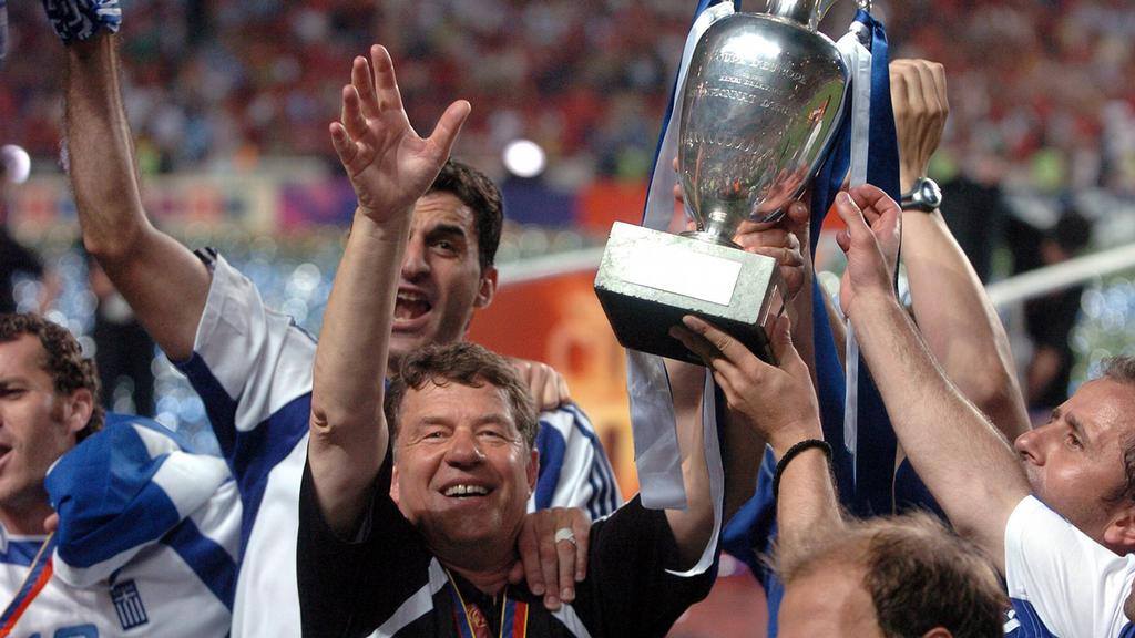 The Greek team lift the trophy