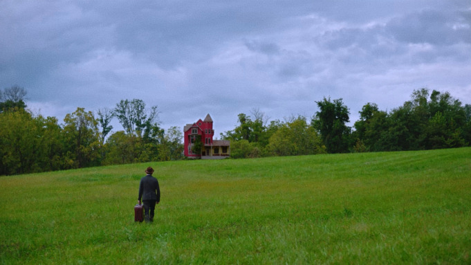 James approaches the remote farmhouse