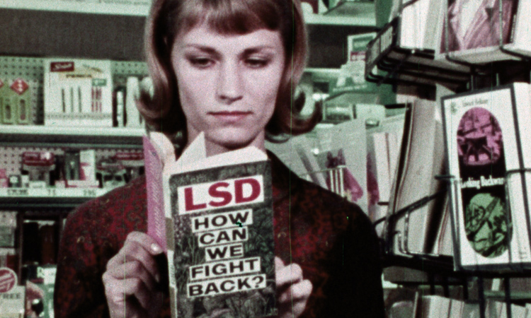 A young woman reading a book about the dangers of LCD
