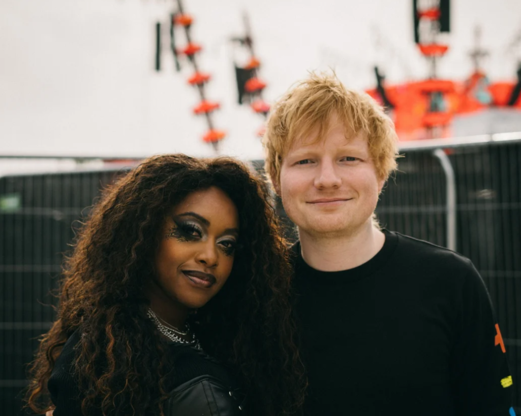 A photo of Irish rapper Denise Chaila with Ed Sheeran, backstage ahead of Ed's sold out concert